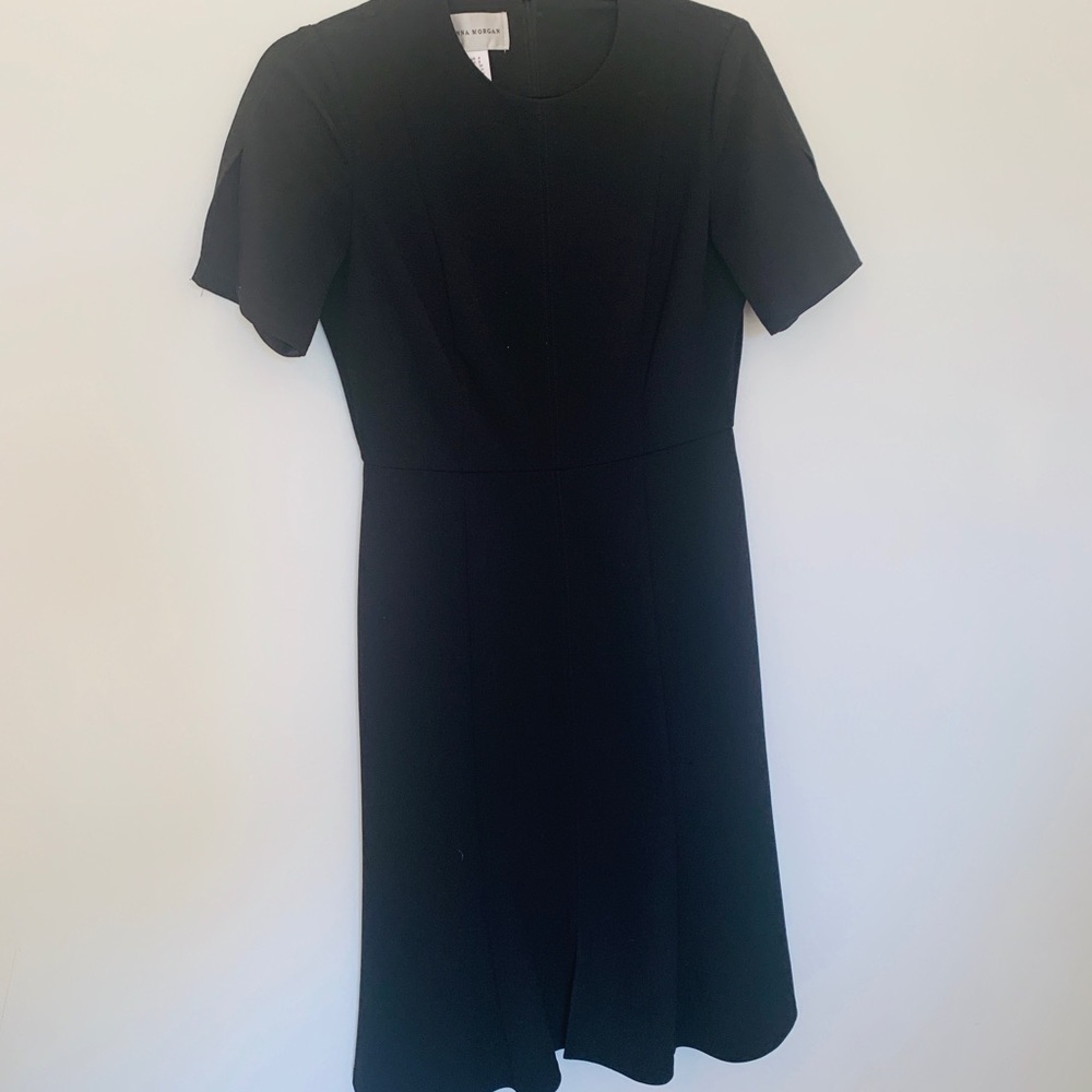 Donna Morgan sleek and classic black work dress.